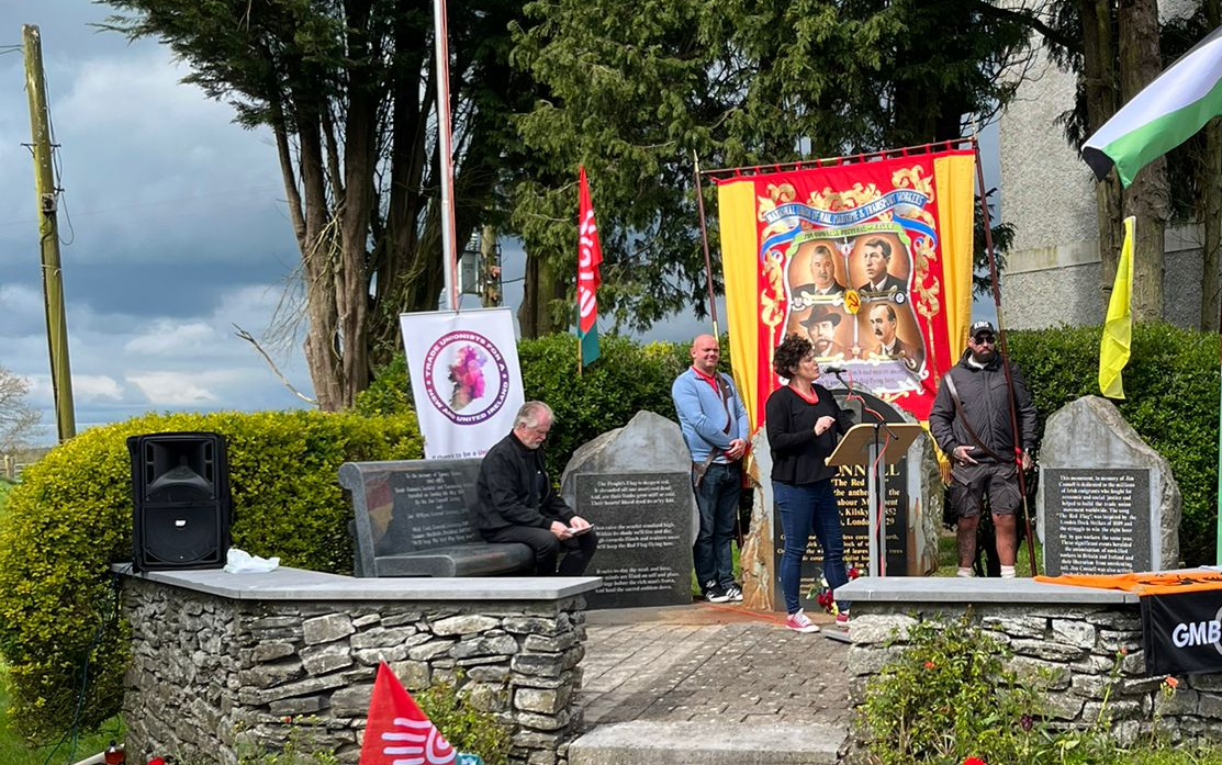 GMB union march with banner and flags